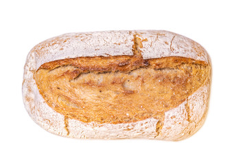 The texture of the crust of bread. Tasty fresh bread, close up. Macro of a french loaf showing the texture of the crust baked brown and golden. Flat lay. Food concept. Isolated on white background