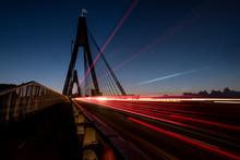 Dawn Traffic Libght Trails On Bridge