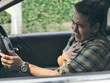 © nuiiko - Asian man with heart attack in car, lifestyle concept.