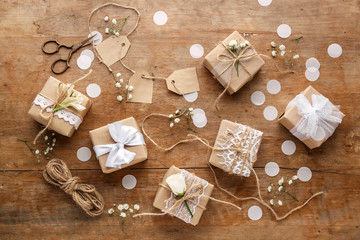 Beautiful handmade gifts on wooden background