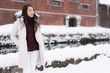 © siraphol - Beautiful young asian woman smile and happy with travel trip in Otaru canal Hokkaido Japan