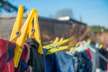 Wall Mural - Clothes drying on a washing line in a residential garden