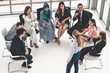 © InfiniteFlow - Businesswomen and businessmen attending group meeting conference in office room. Corporate business team concept.