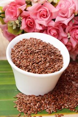 Wall Mural - Flax seeds for health on wood background