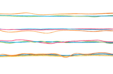 Wall Mural - set of colorful lines of cotton thread isolated on white background. different color pink, green, ye