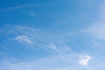 Wall Mural - Clouds on a blue sky as background
