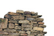 old ancient ruined stonework wall of bricks and stone blocks foreground closeup isolated on white background