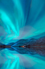 Canvas Print - Northern lights in the sky over Tromso,  Norway