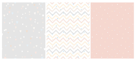 Wall Mural - set of 3 bright delicate chevron, hearts and dots vector patterns. irregular tiny dots pattern. hand