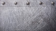 Grunge metal texture with scratches and rivets
