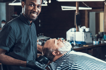 Sticker - Barber master standing near client and smiling