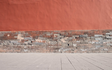  The  old red brick wall with the cement