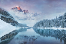 First Snow Morning At Moraine Lake In Banff National Park Alberta Canada Snow-covered Winter Mountain Lake In A Winter Atmosphere. Beautiful Background Photo