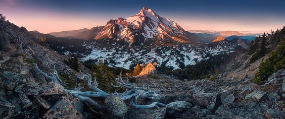 Wall Mural - At 10,492 feet high, Mt Jefferson is Oregon's second tallest mountain.Mount Jefferson Wilderness Area, Oregon The snow covered central Oregon Cascade volcano Mount Jefferson rises above a pine forest 