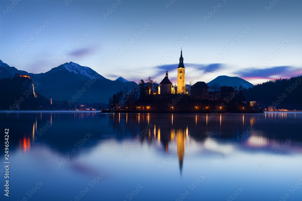 Beautiful view of famous Bled Island (Blejski otok) at scenic Lake Bled ...