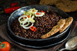 Black lentils and vegetables stew