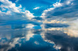 © Gerard - blue sky and clouds reflection