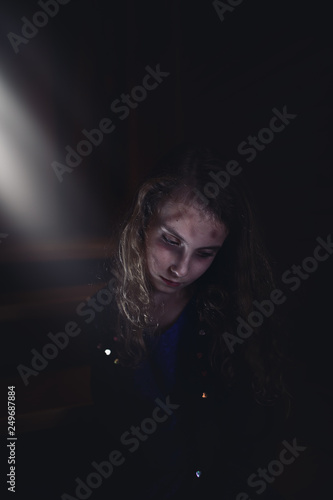 Depressed And Sad Girl Sitting Alone At Home Buy This Stock