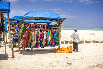 Sticker - Wooden stall with colorful fabrics on Diani beach eascape, Kenya