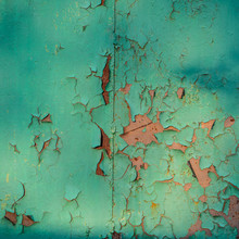 Multicolored Abstract Background: Old Rusty Metalplate Texture Surface Heavily Aged And Corroded With Green Paint Flaking And Cracking