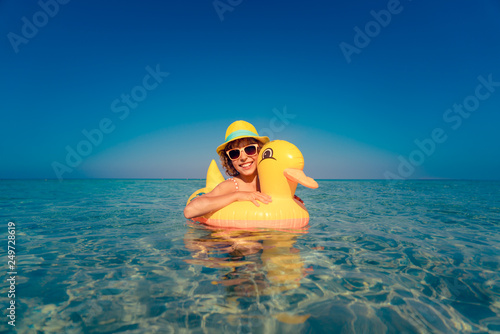 Happy child having fun on summer vacation
