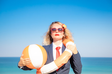 Wall Mural - Successful young businesswoman on a beach