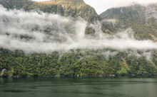Low Hanging Cloudbank In Milford Sound, Fiordland National Park, South Island, New Zealand