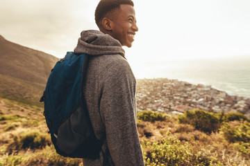 Cheerful hiker admiring the view