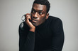 © Jacob Lund - Thoughtful young african guy