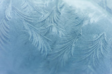 Close Up Of Abstract Patterns Of Ice Forming On A Frozen Windshield