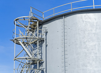 Large water tank with blue sky