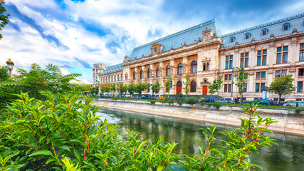 Antique building view in Old Town Bucharest city - capital of Romania and Dambrovita river