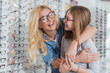 © Yakobchuk Olena - Overjoyed nice woman embracing her lovely daughter