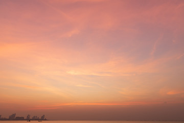 Wall Mural - beautiful dramatic sky and landscape of pattaya city with sea during sunset.