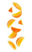 Falling Fresh Orange Fruit Slices Isolated On White Background Closeup. Flying Food Concept.