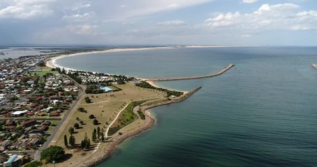 Sticker - Stockton town and long beach cut by delta of Hunter river entering Pacific ocean along Nobbys head and lighthouse in city of Newcastle.