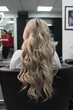 © strigana - Beautiful hairstyle of woman after dying hair and making highlights in hair salon