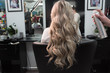 © strigana - Beautiful hairstyle of woman after dying hair and making highlights in hair salon