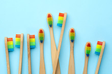 Photo Of Many Toothbrushes With Rainbow-colored Bristles.