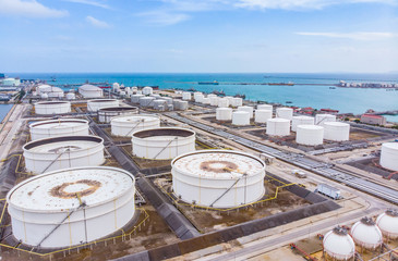 Oil storage tank with oil refinery background, Oil refinery plant at day. Aerial view from drone top view