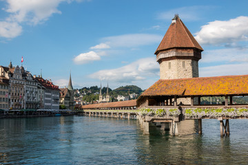 anoramic view of city center of Lucerne with famous Chapel Bridge and lake