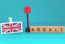 Union Jack Flag, Sign "stop" And Word "brexit" On A Blue Background (concept)