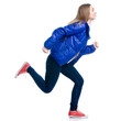 © Kabardins photo - Woman in jeans and jacket running on white background. Isolation