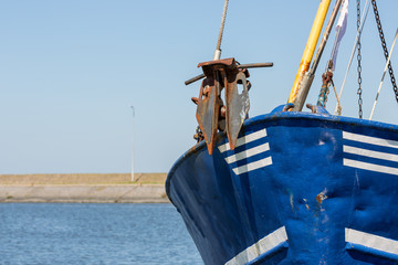 Wall Mural - Bow with anchor shrimp fishing ship in Dutch harbor Lauwersoog