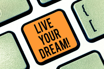 Text sign showing Live Your Dream. Conceptual photo Motivation be successful inspiration happiness achieve goals Keyboard key Intention to create computer message pressing keypad idea