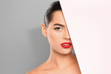 Sticker - Young woman wearing beautiful lipstick on color background. Space for text