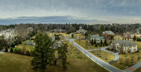 Wall Mural - Aerial panorama of American luxury real estate neighborhood in Maryland with single family houses, mansions, high quality buildings with lot of land