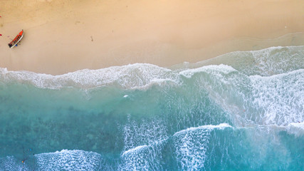 Wall Mural - Aerial : Overhead  view at  empty sand  beach line ,waves breaking against the coast