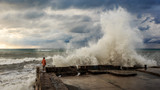 Fototapeta Na ścianę - Storm waves over a pier in the Adler, Sochi