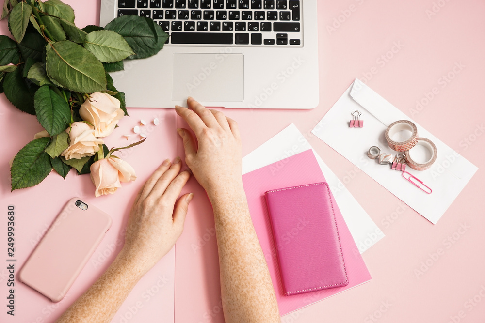 Female hands, laptop and items for crafting on color background